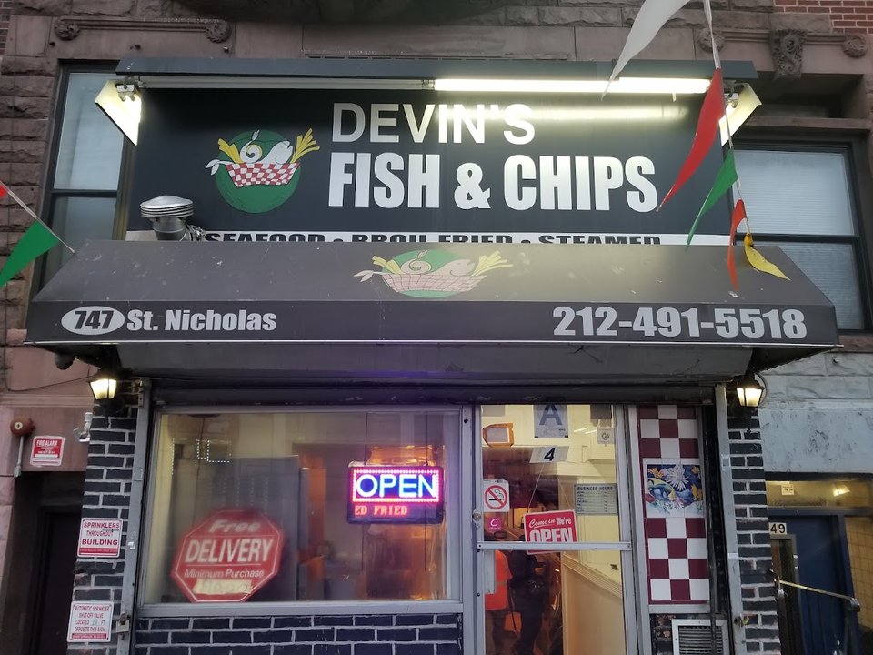 Counter-serve seafood spot with simple seating.